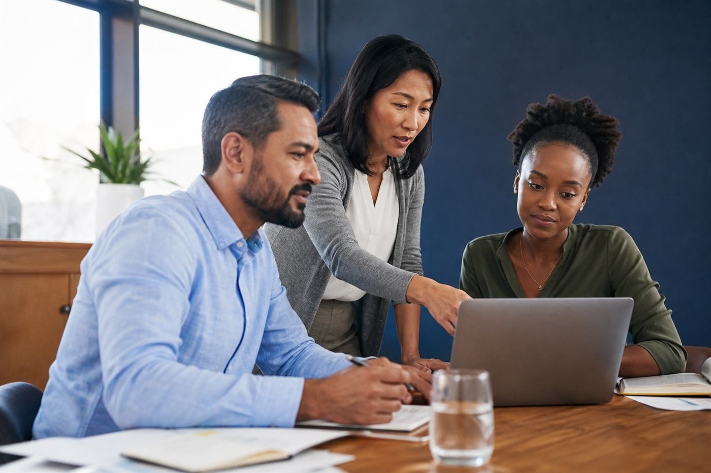 A team reviewing publisher options in a meeting